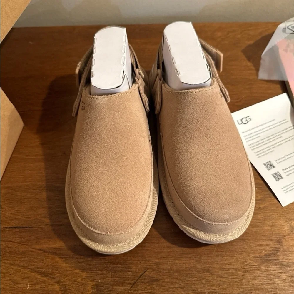 Brand new in box! UGG Kids Tan Slip-On Shoes